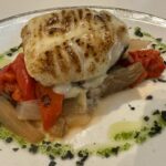 Bacalao con verduritas y alioli de miel gratinado